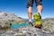 Mountaineer walking over a rock in the alps