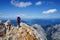 Mountaineer woman on top of a mountain