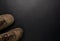 mountaineering shoes on black background