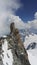 Mountaineers climbing on a rock near the Aiguille du Midi in the Mont Blanc massif, France, Europe