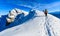 Mountaineers walking on the mountain ridge