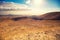 Mountainous desert with a beautiful cloudy sky