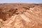 Mountainous relief in desert. view fortress Massada in Israel near Dead Sea