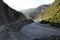 Mountainous road leading to Lahic village in Ismayilli region of Azerbaijan, with car