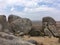 In the mountains of California in the summer. Stones, sand, sun