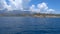 Mountains in the clouds, the view from the ship sailing on the Mediterranean sea, Turkey.