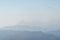 Mountains in a cold haze. Mountain landscape in the fog. Wallpaper