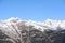 Mountains covered with snow and overgrown with spruce - The Principality of Andorra, Pyrenees, Europe.