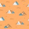 The mountains. Decorative image of mountains, bushes. Seamless vector pattern on an orange background.