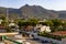 Mountains. Desert of Las Palmas seen from the town of Benicasim, in CastellÃ³n. Mountainous and rocky system with green trees