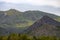 Mountains. Desert of Las Palmas seen from the town of Benicasim, in CastellÃ³n. Mountainous and rocky system with green trees