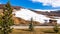 Mountains in early spring, slopes and pistes with ski lifts, Livigno village, Italy, Alps