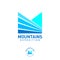 Mountains expedition logo. M monogram. Letter M like mountain fields and blue peaks.