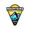 Mountains expeditions logo badge in modern colorful style