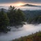 Mountains in fog at beautiful autumn in Phetchabun Thailand. Fog mountain valley, low clouds, forest,