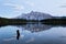 Mountains and forests reflected in Two Jack Lake