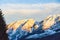 Mountains Grimming, Schartenspitze and Steinfeldspitze on a sunny winter day in Bad Mitterndorf in Styria, Austria