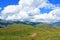 mountains. Kazakh jailau. Yurt with horses