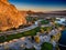 Mountains, lake, canal and golf course at sunrise