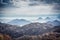 Mountains landscape with mountains peaks on sea coast with dramatic sky in overcast day with mist in Europe country Montenegro