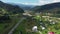 Mountains landscape with River and Beautiful Road aerial view.