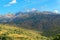 Mountains and meadows under blue sky