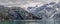 Mountains & Ocean with cloudy sky at Glacier Bay Alaska