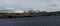 Mountains overlooking a cold lake in the Scottish Highlands