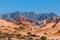 Mountains and red rocks on the horizon landscape in the Valley of Fire State Park, Nevada, USA