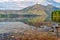 Mountains Reflected in the Waters of Lake MacDonald in Glacier National Park