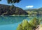 Mountains Reflecting In The Beautiful Turquoise Water Of The Lustrafjord