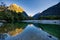 Mountains reflecting in Clinton river, Milford track, New Zealand