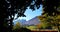 Mountains relief under the blue sky with autumn vegetation.