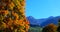 Mountains relief under the blue sky with autumn vegetation.