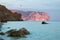 Mountains, rocks and sea in evening time