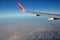 Mountains and sky as seen through window of an aircraft. Classic image airplane wind