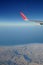 Mountains and sky as seen through window of an aircraft. Classic image airplane wind