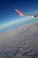 Mountains and sky as seen through window of an aircraft. Classic image airplane wind