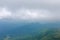 Mountains and sky with blue background