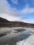 Mountains sky river stones forest