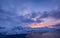 Mountains and sky during sunset. Senja island, Norway. Clouds on the sky during sundown.