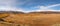 Mountains steppe aerial view autumn snow clouds