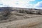 The mountains, steppes, bushes, grass and cloudy sky. Spring