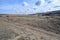 The mountains, steppes, bushes, grass and cloudy sky. Spring