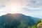 Mountains in summer time sunrise cloud forest Worlds End in Horton Plains National Park Sri Lanka