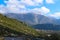 Mountains topped with snow and fog as seen driving down out of the Taygetos mountain range on the Peloponnese peninsula south of K