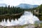 Mountains towering above the Rancheria River in Yukon, Canada