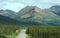 Mountains, trees, and clouds