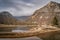 Mountains and trees reflecting in artificial ponds. Pyrenees Mountains. France