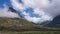 Mountains on Trolstigen over the green rock field